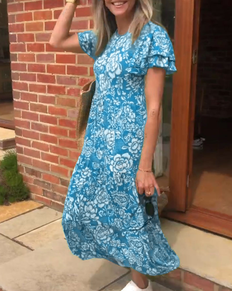 ModeHuis® | Lange jurk met korte mouwen en bloemenprint