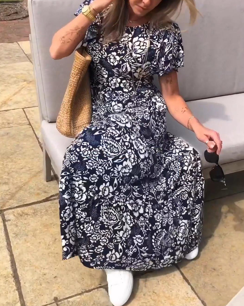 ModeHuis® | Lange jurk met korte mouwen en bloemenprint
