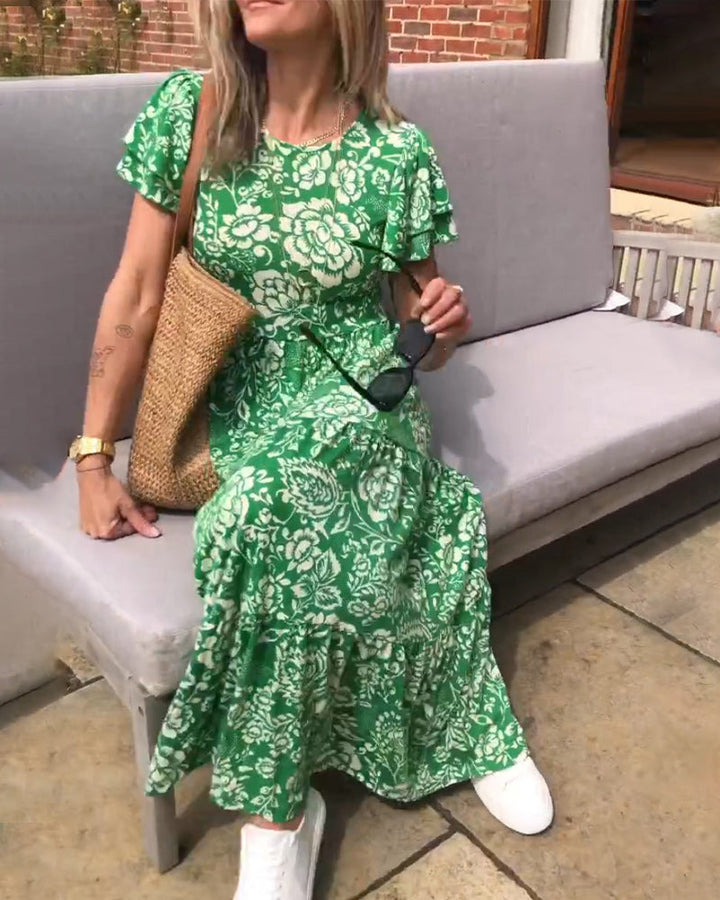ModeHuis® | Lange jurk met korte mouwen en bloemenprint