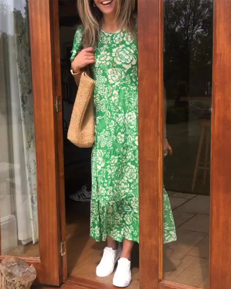 ModeHuis® | Lange jurk met korte mouwen en bloemenprint