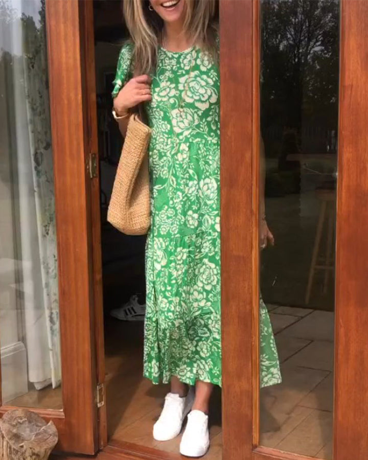 ModeHuis® | Lange jurk met korte mouwen en bloemenprint