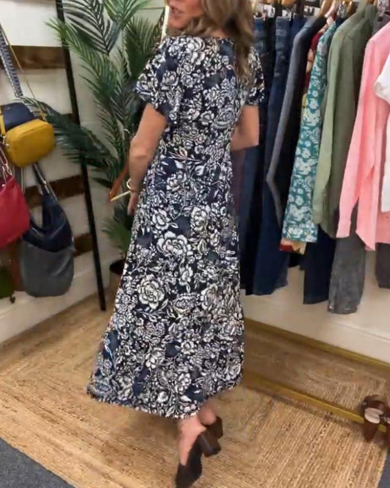 ModeHuis® | Lange jurk met korte mouwen en bloemenprint