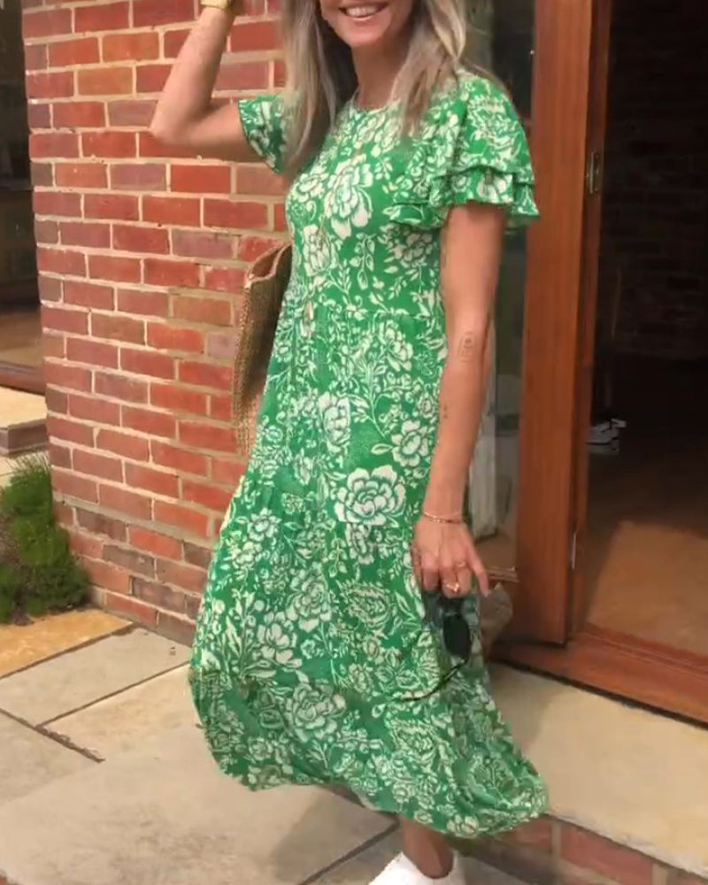 ModeHuis® | Lange jurk met korte mouwen en bloemenprint